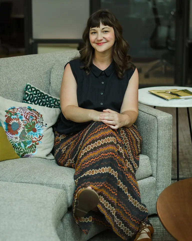 woman sitting with legs crossed