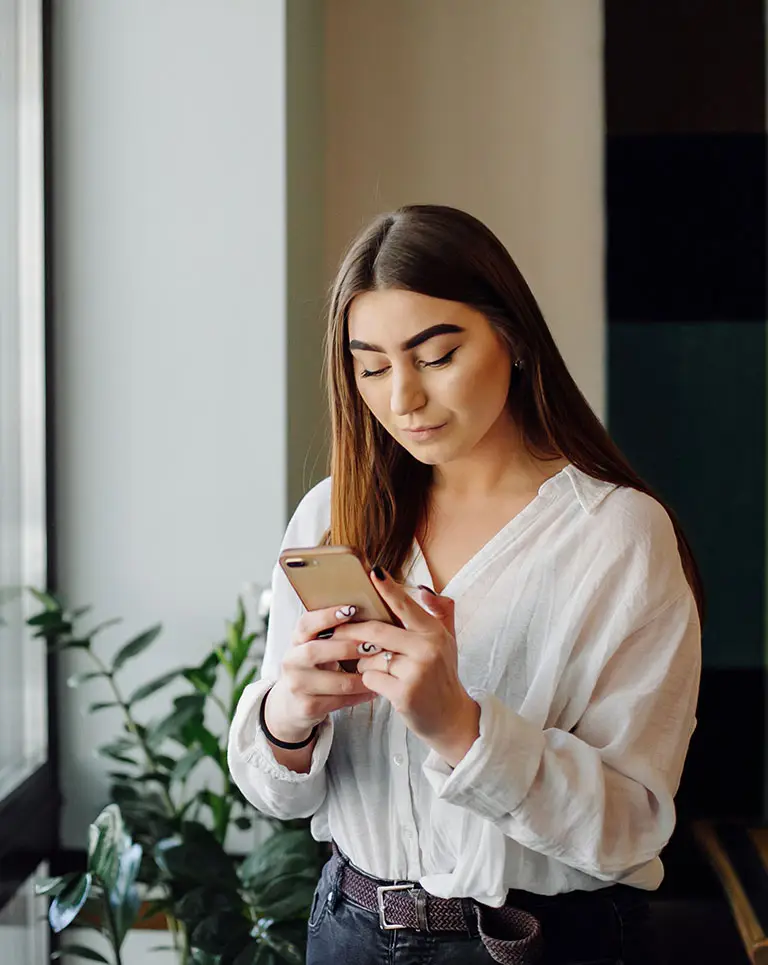 girl looking at phone