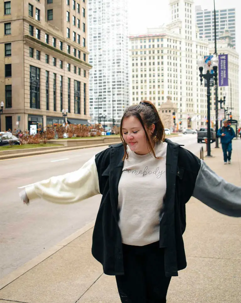 a woman standing on a street