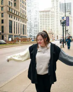 a woman standing on a street