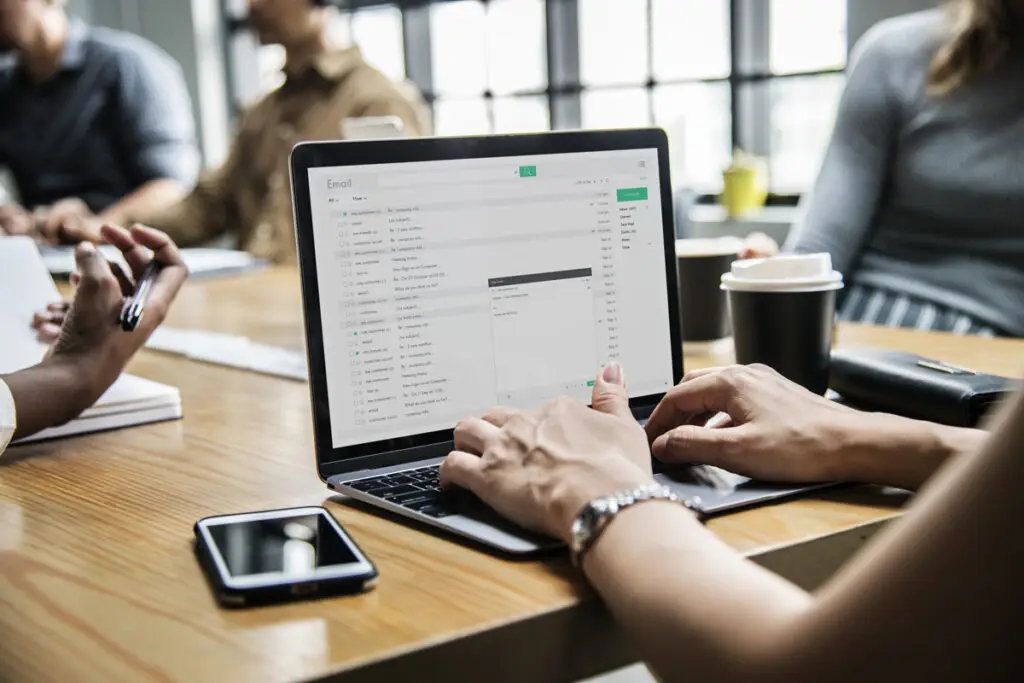 person on computer looking at mass market emails