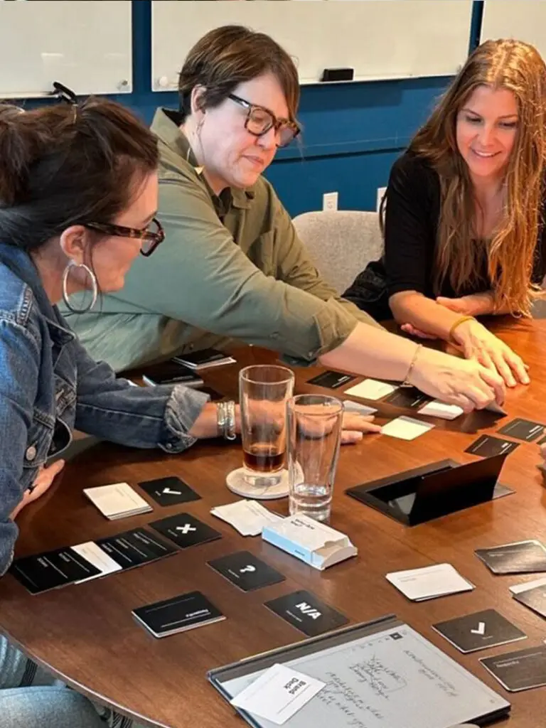 3 women participating in on table activity