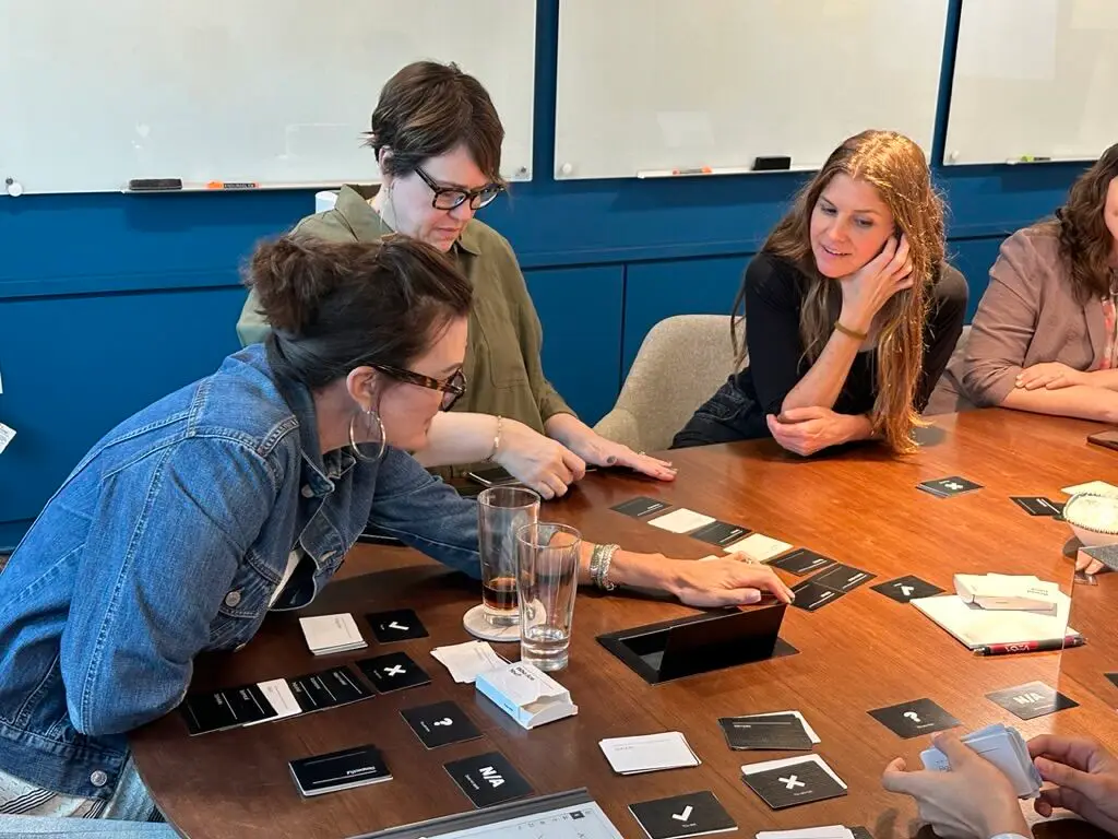 3 women participating in on table activity